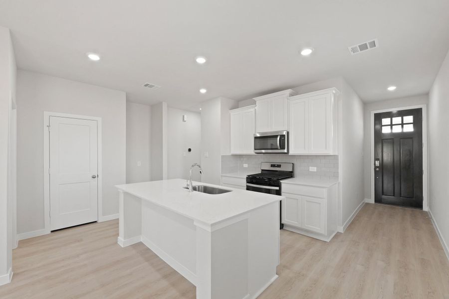 Furnished interior view inside a new home in River Ranch Trails, Dayton (Image 9).