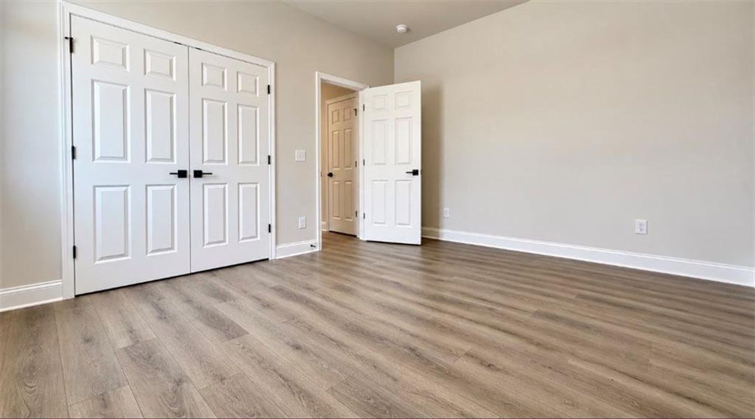 Spacious, unfurnished interior of a new home in Wehunt Meadows, Hoschton (Image 11).