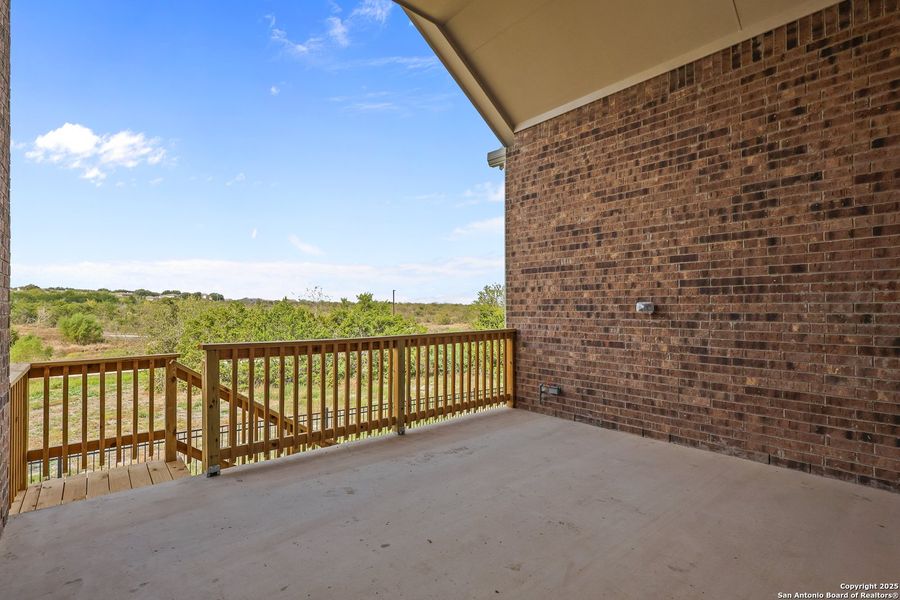 Exterior details and patio area of a home in Homestead 75', Schertz (Image 4).