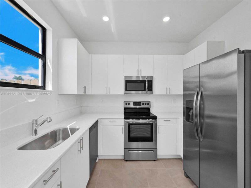 Furnished interior view inside a new home in , Homestead (Image 12). Furnished interior view inside a new home in , Homestead (Image 12).