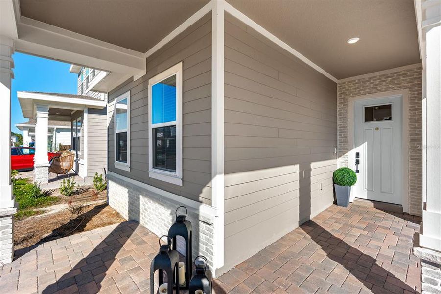 Exterior details and patio area of a home in Weslyn Park at Sunbridge, St. Cloud (Image 33).
