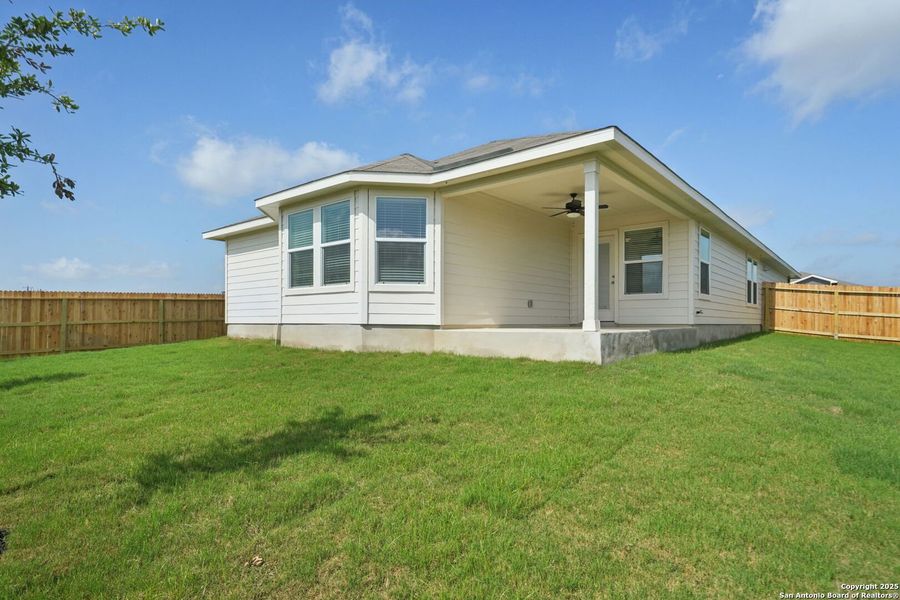Front exterior of a new home in Estancia Ranch - Premier Series, San Antonio, TX, highlighting curb appeal (Image 19).