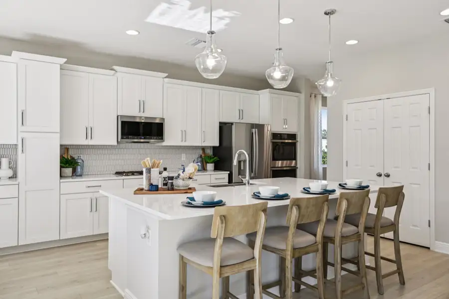 Representative furnished interior of a home built from the Palmer Executive by Risewell Homes in Bargrove Estates, Mount Dora (Image 8).
