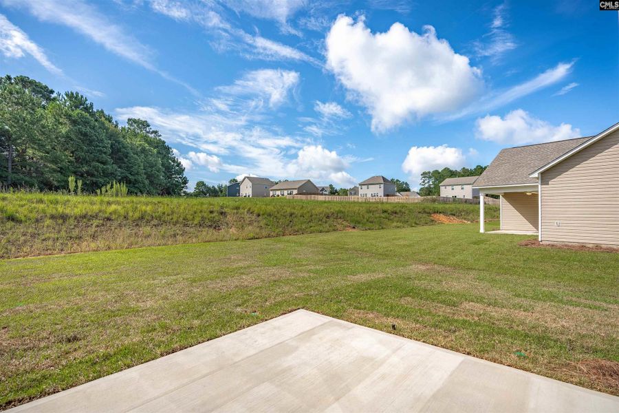 Front exterior of a new home in Rolling Hills, Prosperity, SC, highlighting curb appeal (Image 25).
