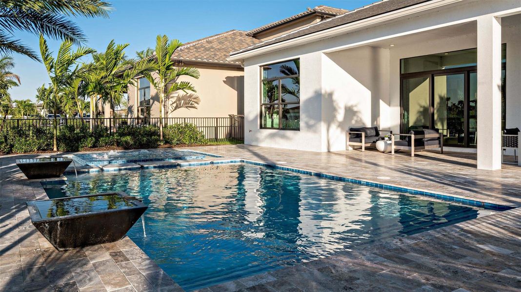 Exterior details and patio area of a home in Cresswind Palm Beach at Westlake, Westlake (Image 23).