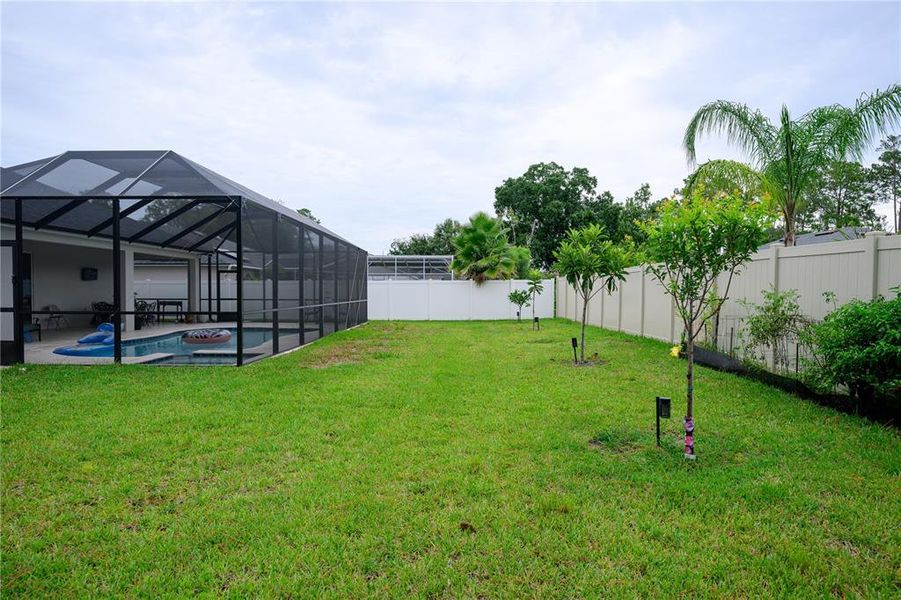 Exterior details and patio area of a home in , Palm Coast (Image 21).
