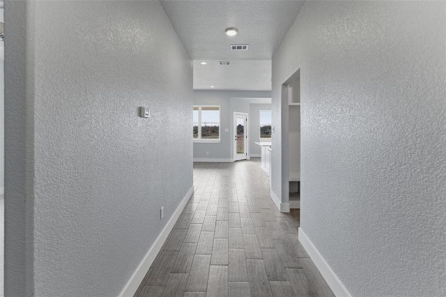 View from the front entry looking into the main living area. View from the front entry looking into the main living area.