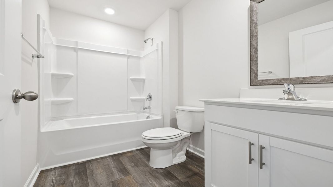 Furnished interior view inside a new home in Bentley Park, Greenwood (Image 5).