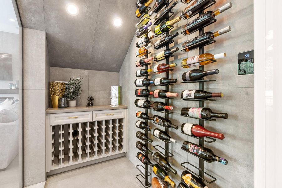 Sophisticated climate control wine room that can hold up to 100 bottles. Sophisticated climate control wine room that can hold up to 100 bottles.