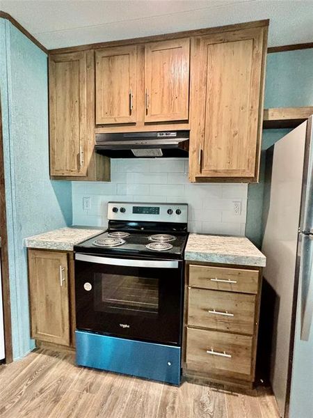 Furnished interior view inside a new home in , Quinlan (Image 12).