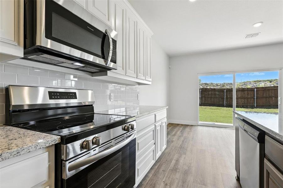 Furnished interior view inside a new home in Stoneview, Glen Rose (Image 3). Furnished interior view inside a new home in Stoneview, Glen Rose (Image 3).