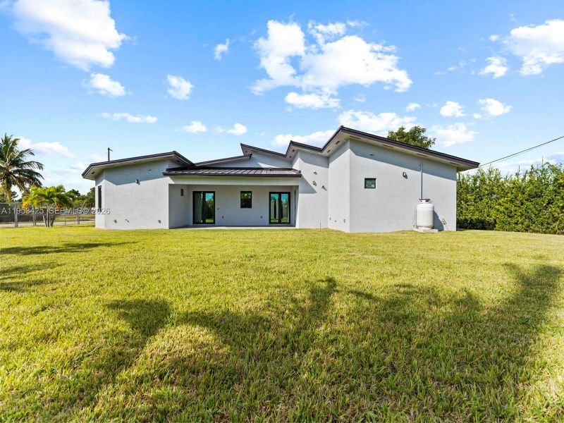 Exterior details and patio area of a home in , Goulds (Image 4).