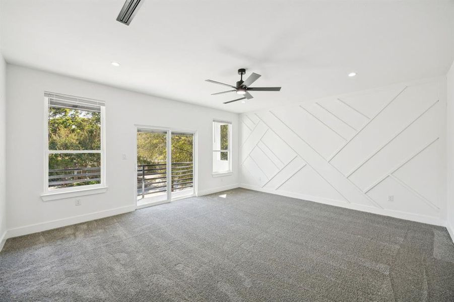 Unfurnished room with carpet flooring, ceiling fan, and recessed lighting