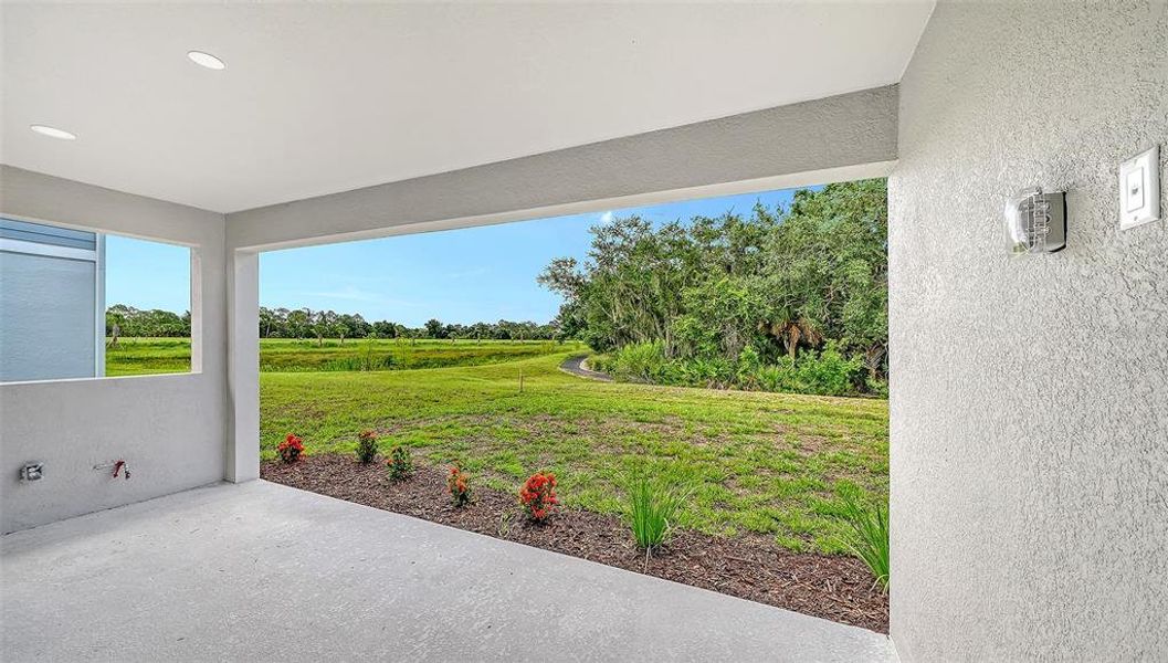 Exterior details and patio area of a home in Grand Park, Sarasota (Image 22).