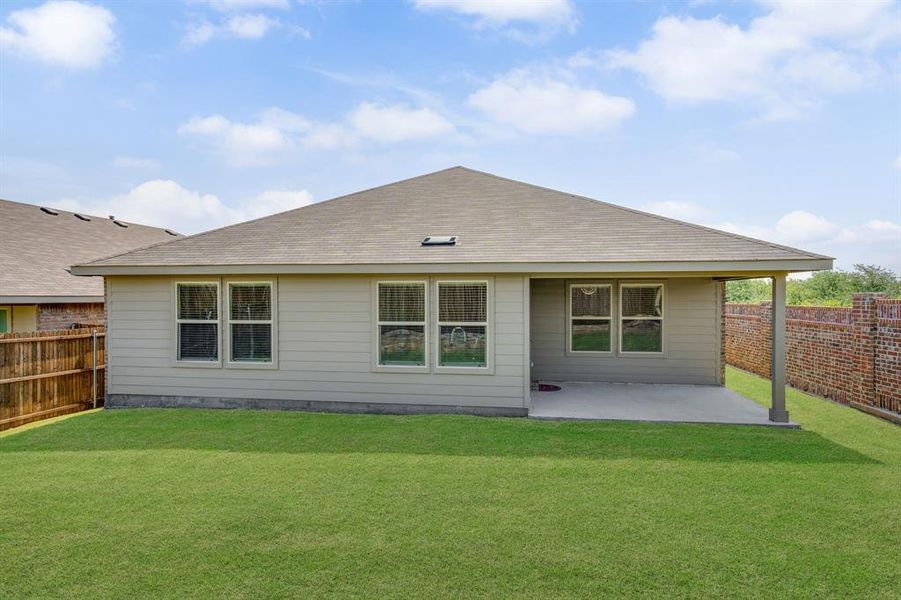 Front exterior of a new home in Cambridge Brook, Denton, TX, highlighting curb appeal (Image 21). Front exterior of a new home in Cambridge Brook, Denton, TX, highlighting curb appeal (Image 21).