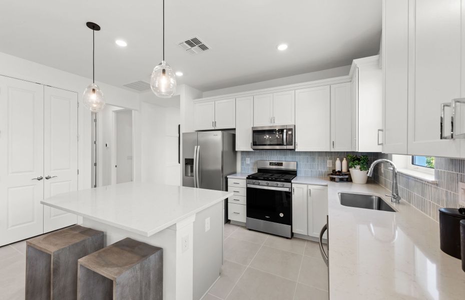 Representative furnished interior of a home built from the Ellenwood by Pulte Homes in Shores at Stillwater, Englewood (Image 11).