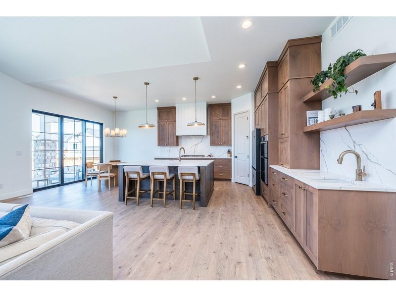 Furnished interior view inside a new home in Greenspire At Windsor Lake, Windsor (Image 8).