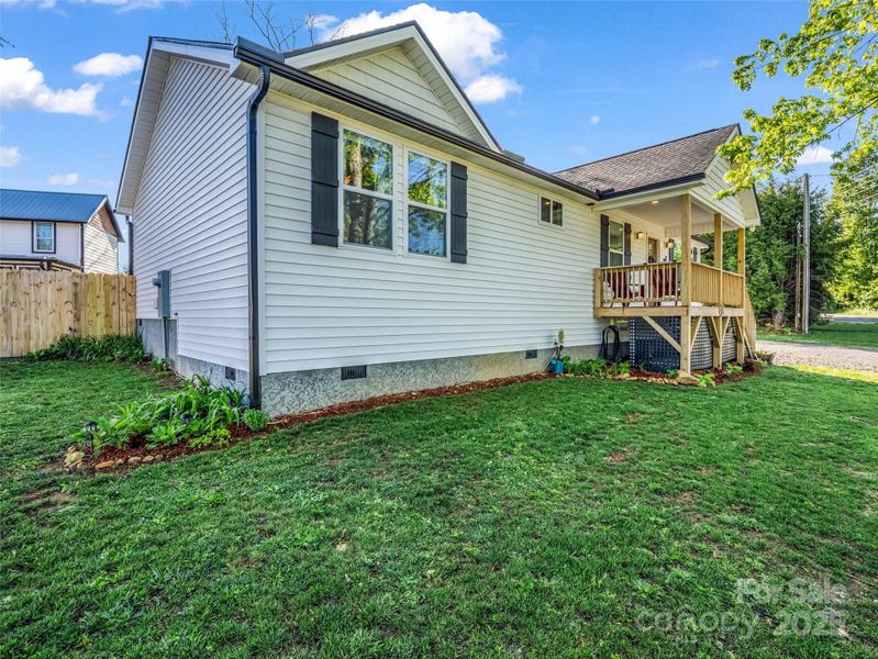 Exterior details and patio area of a home in , Black Mountain (Image 26).