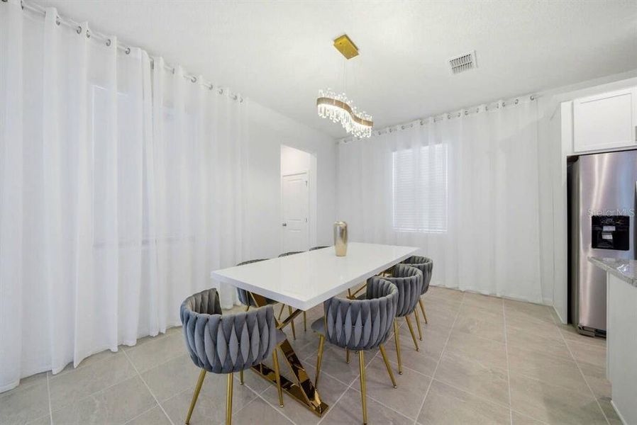 Furnished interior view inside a new home in Solara Resort, Kissimmee (Image 25).