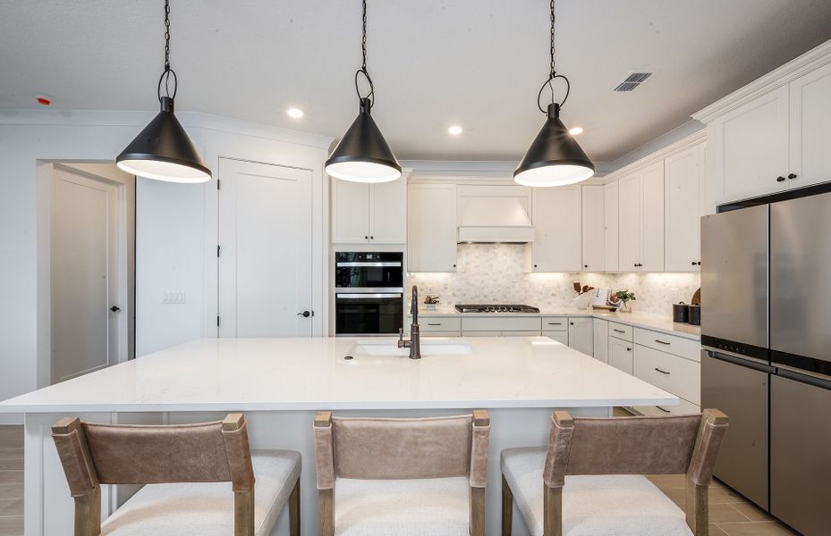 Representative furnished interior of a home built from the Mystique by Pulte Homes in Riversong, Parrish (Image 13).