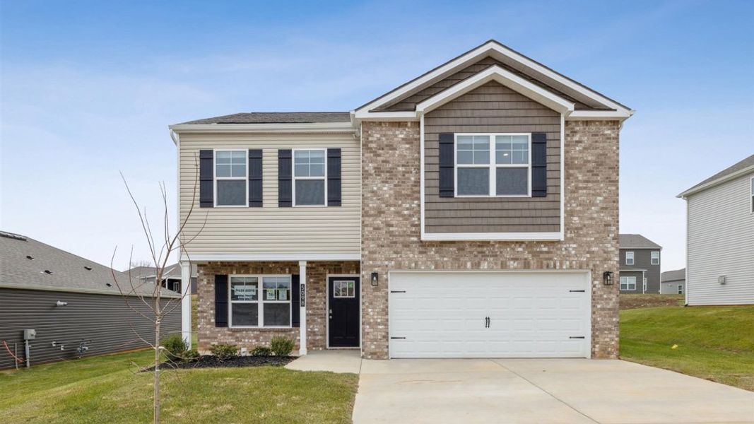 Front exterior of a new home in Millstone Village, Morristown, TN, highlighting curb appeal (Image 1). Front exterior of a new home in Millstone Village, Morristown, TN, highlighting curb appeal (Image 1).