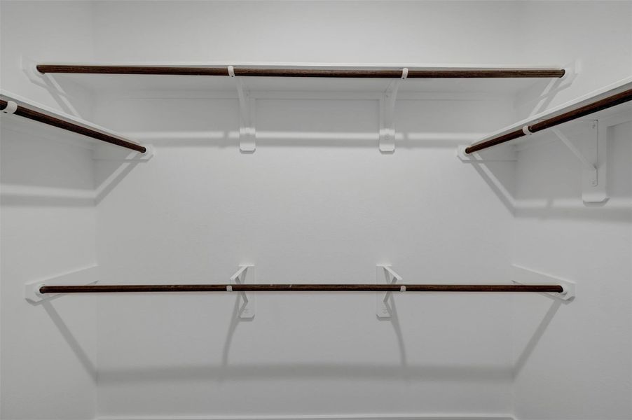 Primary walk-in closet (*Photo not of actual home and used for illustration purposes only.)