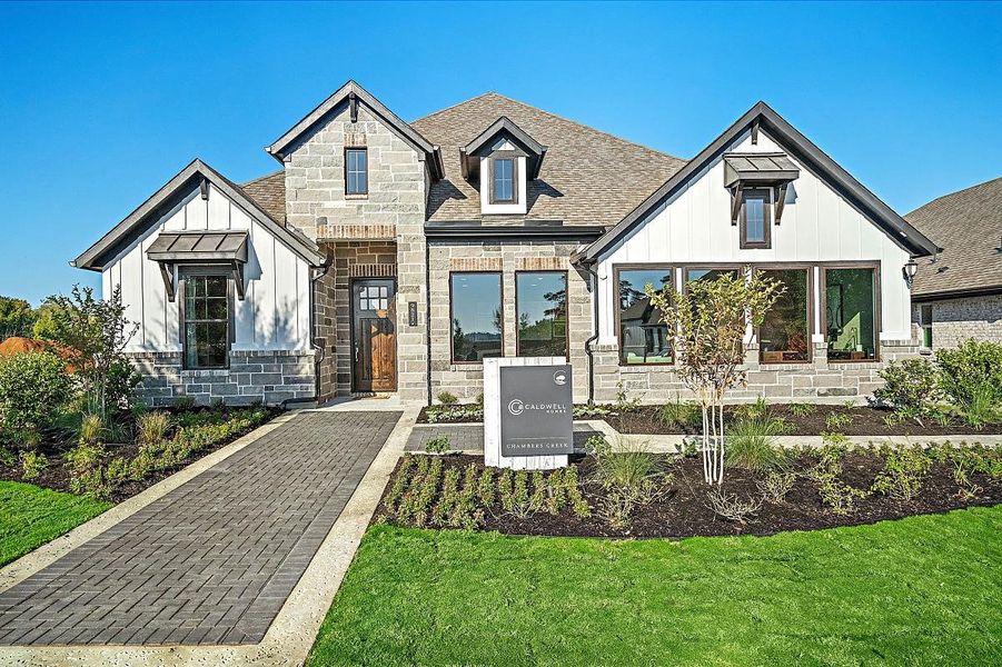 Representative exterior photo of a completed home built from the Bergamot by Caldwell Homes in Chambers Creek, Willis, TX (Image 22). Representative exterior photo of a completed home built from the Bergamot by Caldwell Homes in Chambers Creek, Willis, TX (Image 22).