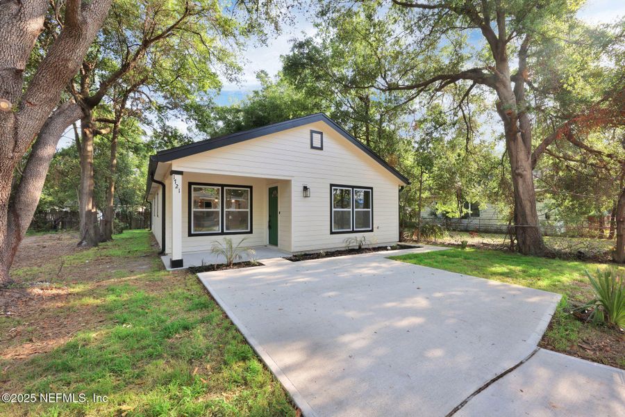 Front exterior of a new home in , Jacksonville, FL, highlighting curb appeal (Image 18). Front exterior of a new home in , Jacksonville, FL, highlighting curb appeal (Image 18).