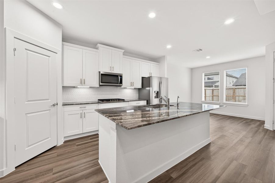 Furnished interior view inside a new home in Harvest Green, Richmond (Image 9).