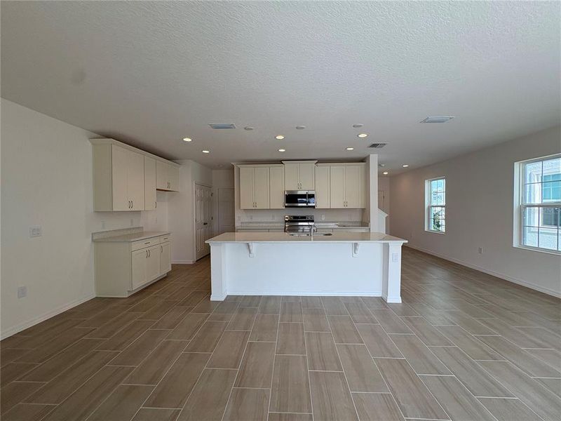 Furnished interior view inside a new home in Sky Lakes Towns, St. Cloud (Image 5).