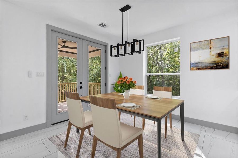 Virtually staged - Dining area nad French doors leading to the covered back deck