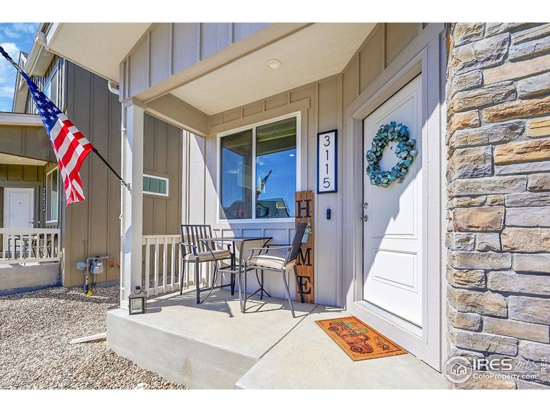 Front exterior of a new home in , Loveland, CO, highlighting curb appeal (Image 23).