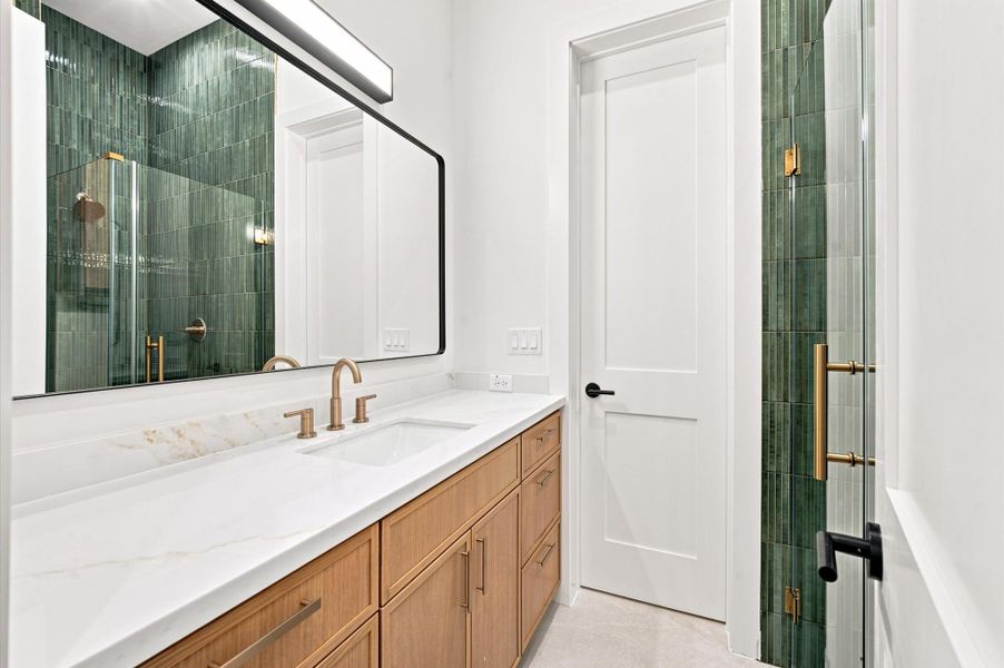 Full bathroom for first floor guest suite or optional study.