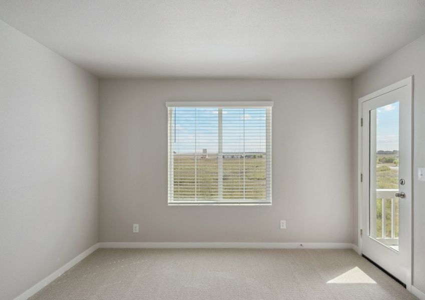The master bedroom is spacious and has access to a deck. The master bedroom is spacious and has access to a deck.