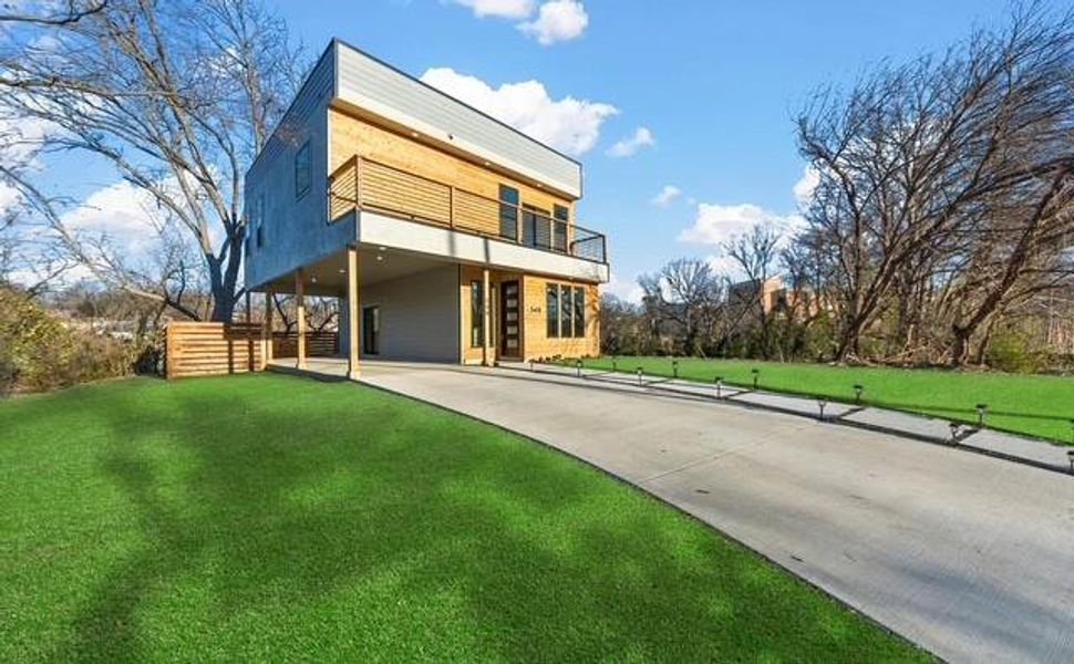 Front exterior of a new home in , Dallas, TX, highlighting curb appeal (Image 24).