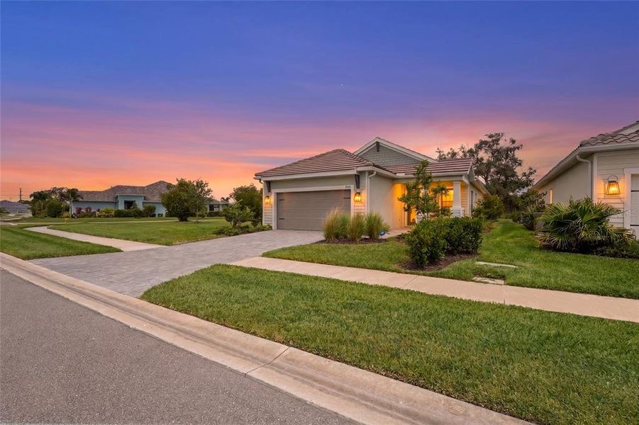 Front exterior of a new home in , Sarasota, FL, highlighting curb appeal (Image 30).