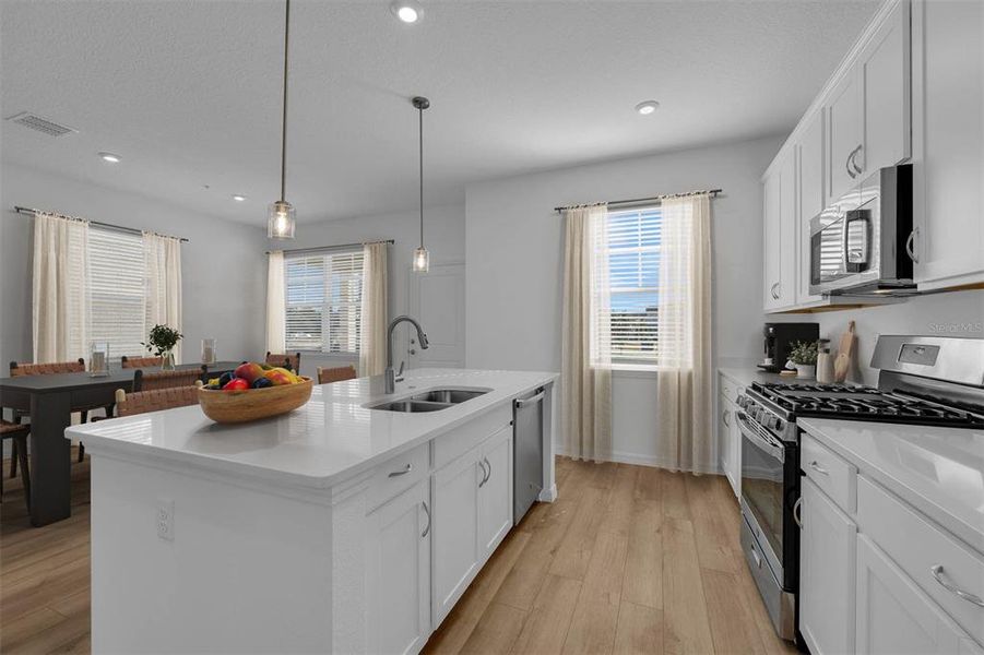 Furnished interior view inside a new home in Brack Ranch, St. Cloud (Image 3).