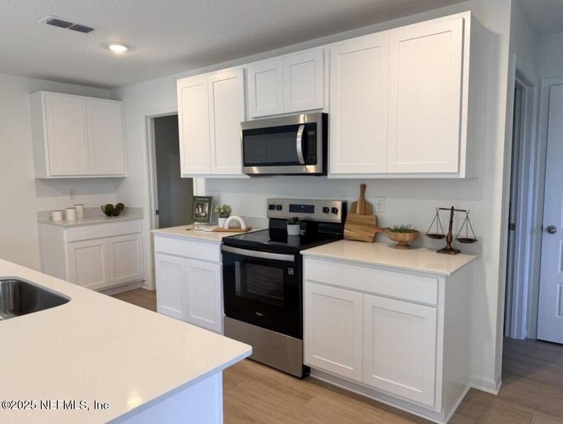 Furnished interior view inside a new home in The Arbors, Jacksonville (Image 6). Furnished interior view inside a new home in The Arbors, Jacksonville (Image 6).