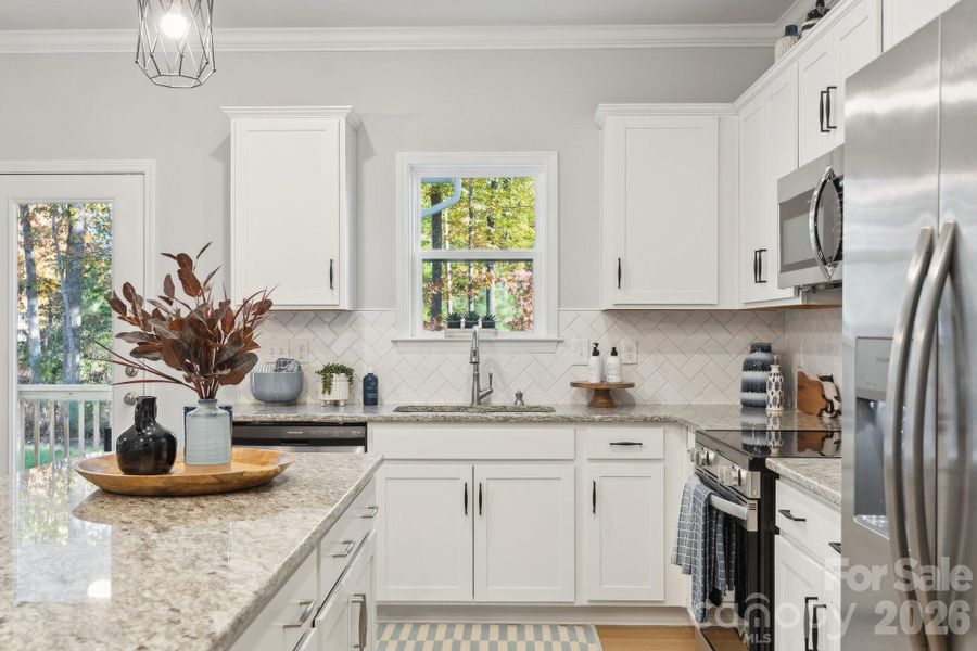 Furnished interior view inside a new home in Piper Creek, Newton (Image 3).