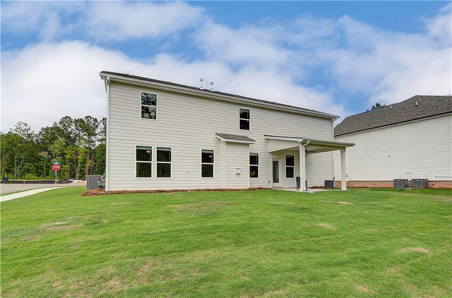 Front exterior of a new home in Kingston, Locust Grove, GA, highlighting curb appeal (Image 22).