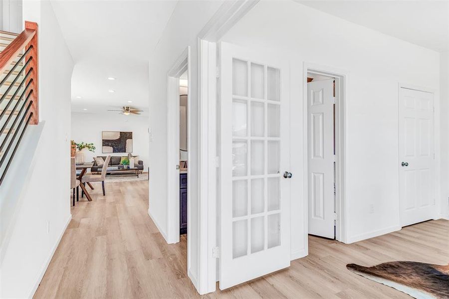 Corridor featuring light hardwood / wood-style floors