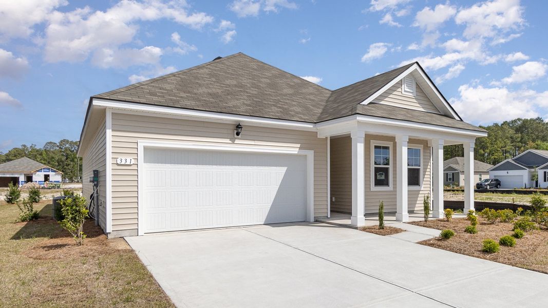 Front exterior of a new home in Sandpiper Place, Myrtle Beach, SC, highlighting curb appeal (Image 2).