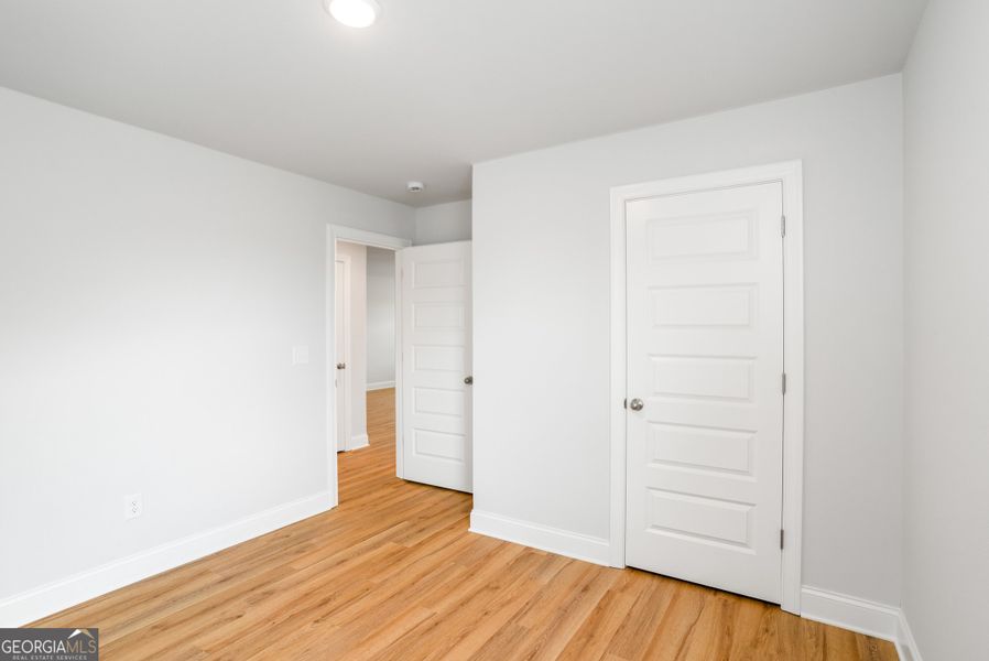 Spacious, unfurnished interior of a new home in Harley Farms South, Bonaire (Image 26). Spacious, unfurnished interior of a new home in Harley Farms South, Bonaire (Image 26).