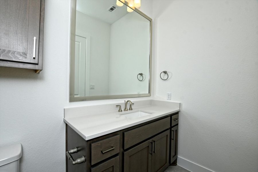 Representative furnished interior of a home built from the Siena III by Giddens Homes in Clearwater Ranch, Liberty Hill (Image 186).