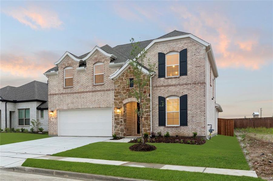 Front exterior of a new home in Creekside, Royse City, TX, highlighting curb appeal (Image 2).