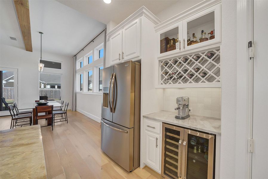 Furnished interior view inside a new home in , Cypress (Image 5).