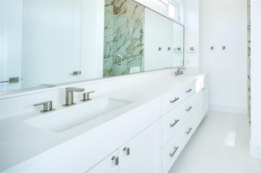 Bathroom featuring vanity, an enclosed shower, and tile patterned floors