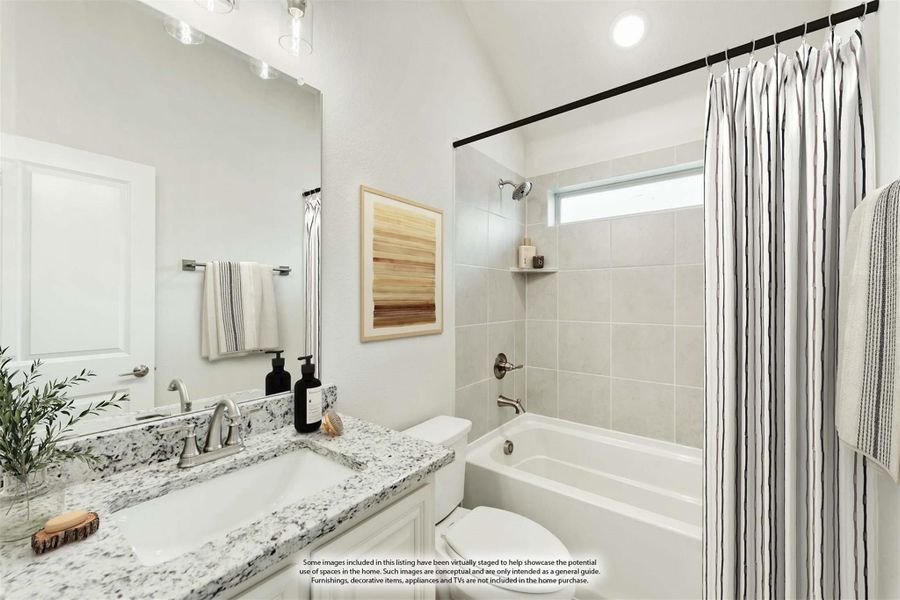 Bathroom with granite countertop vanity, white tub-shower combo with tile surround, and vaulted ceiling Bathroom with granite countertop vanity, white tub-shower combo with tile surround, and vaulted ceiling
