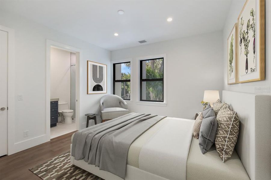 Downstairs guest bedroom, ensuite bathroom. Virtually staged.