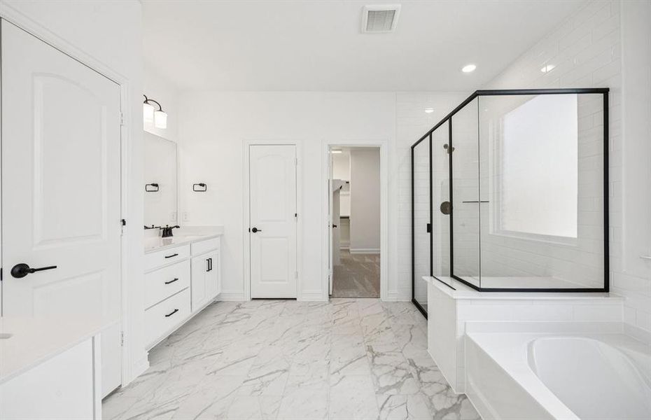 Owner's private bath with generous shower Owner's private bath with generous shower